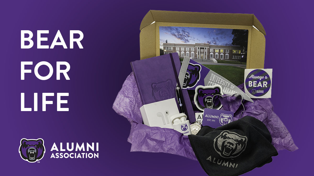 Purple background with white wording saying Bear for Life followed by 小草影院 Bear Head alumni logo. On the right side is a box filled with 小草影院 alumni branded items. 
